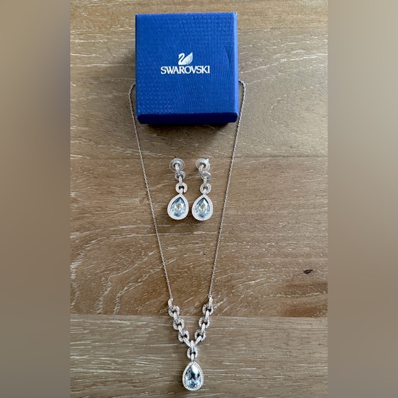 Swarovski Jewelry - Swarovski Silver Necklace and Teardrop Blue Crystal Earrings